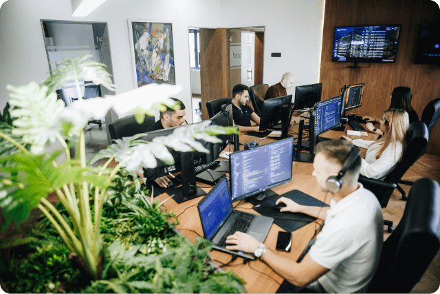Software developers working at Boopro office